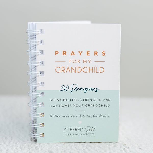 Notebook titled 'Prayers for My Grandchild' on a light gray background